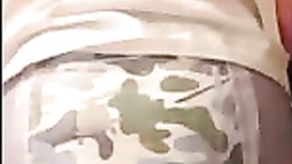 Boy wets and messes his diaper