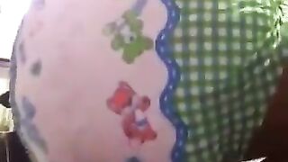 Baby boy diaper mess