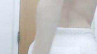 Baby boy shows off wet diaper