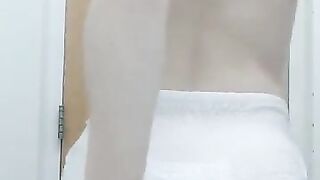 Baby boy shows off wet diaper