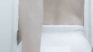 Baby boy shows off wet diaper