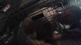 Caged fag in wet diaper