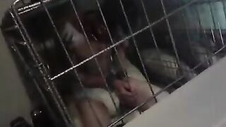 Caged fag in wet diaper