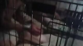 Caged fag in wet diaper