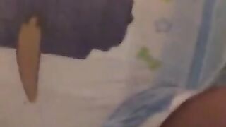teen boy messes his diaper