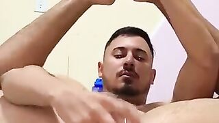 latino faggot uses a dildo in his ass