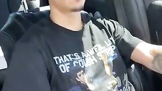 Sexy Latino pulling his big uncut dick out driving