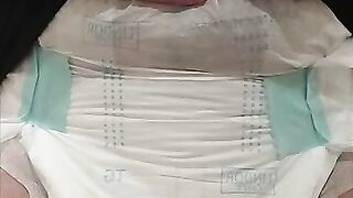 Me pissing my diaper - video 3
