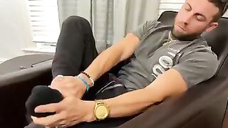 MAN RELAXING HIS BIG FEET