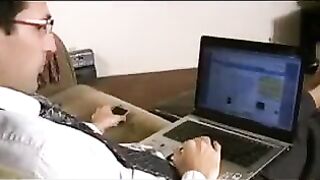 Gay slave licks his master feet while he is working