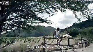 Gay man puts his feet on his boyfriend