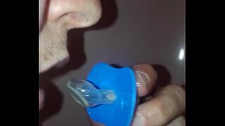 He pisses on his pacifier before sucking