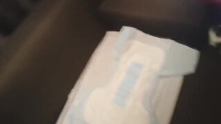 Nappy twink gets padded in a thick adult baby nappy