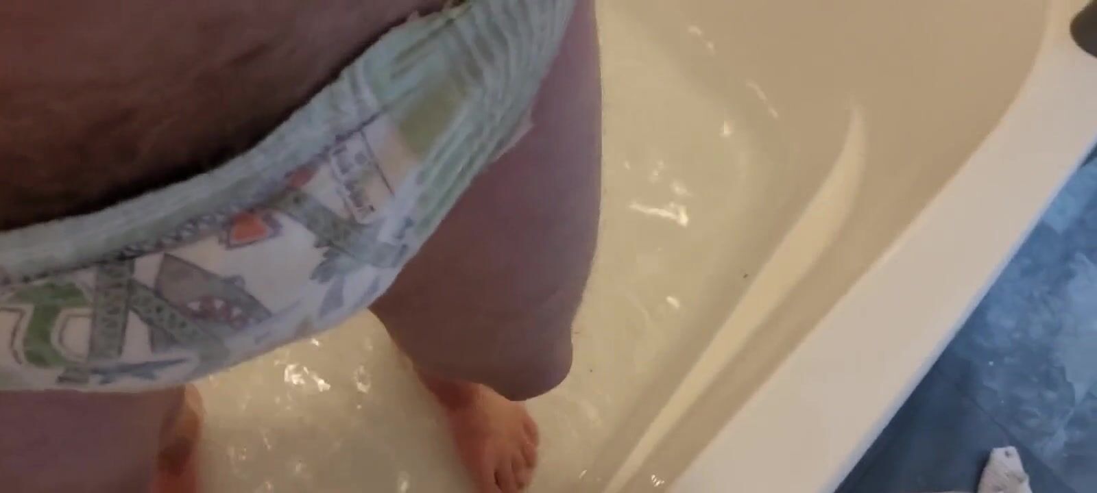 Butt plug in my bum and nappy in the bath