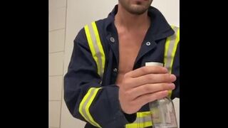 Jacking cock in work uniform