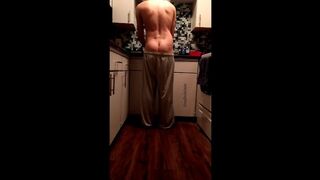 Pants slowly fall down while doing dishes