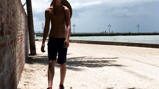18 year old highschool stud having fun flashing his cock at the beach.