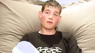 Lovely British twink Shaun plays with his hairy dick solo