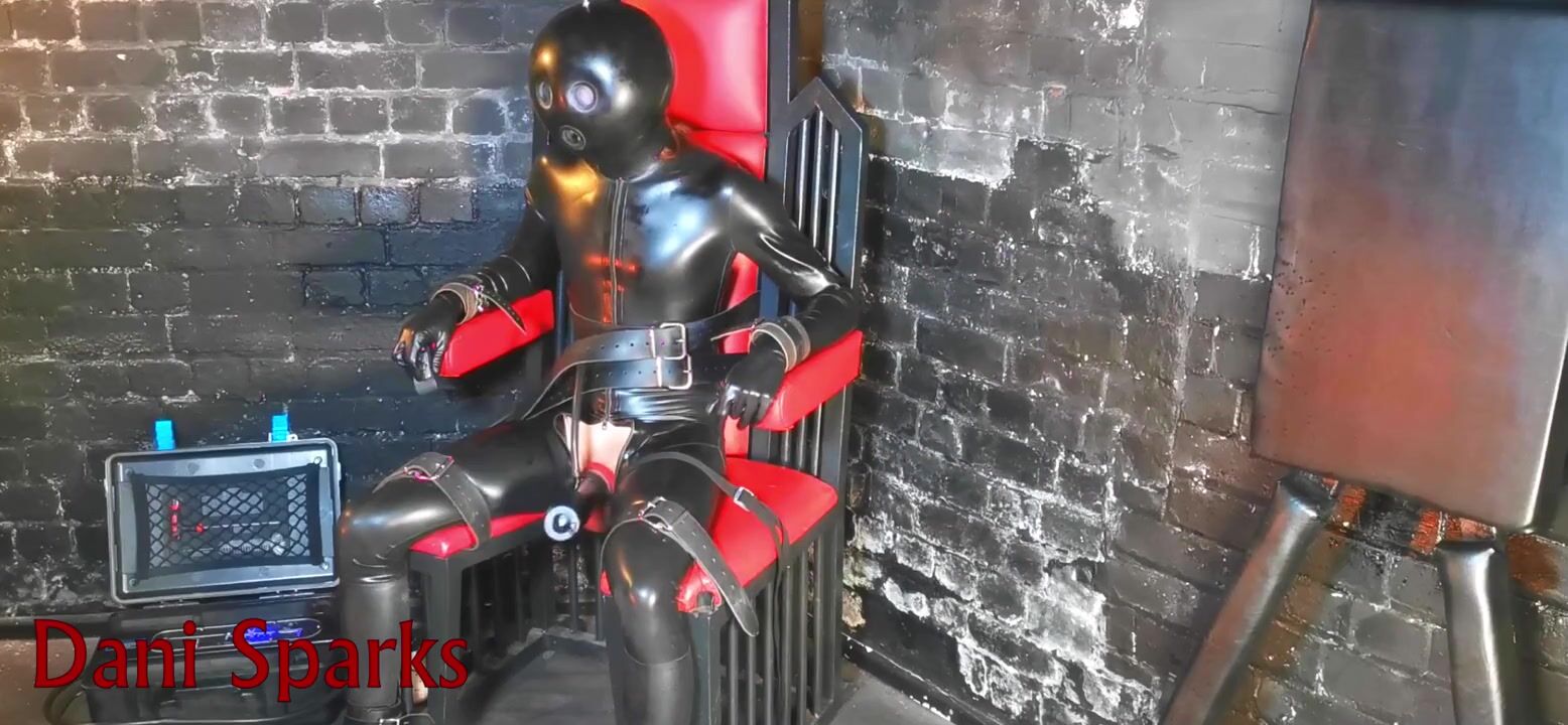 latex gimp tied up in the milking chair