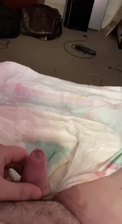Pissing and playing with my cock in a Diaper