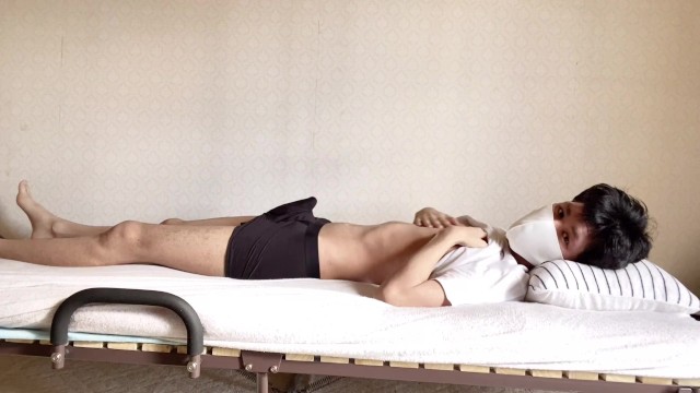 Perverted Japanese boys rubbing their cocks on the bed.