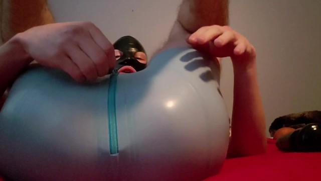 Latex Boytoy Takes HUGE Toys in the Ass