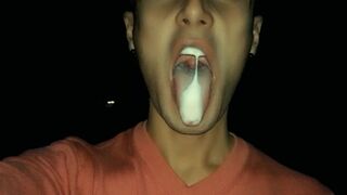 Chewing and making bubbles foam of friends cum public